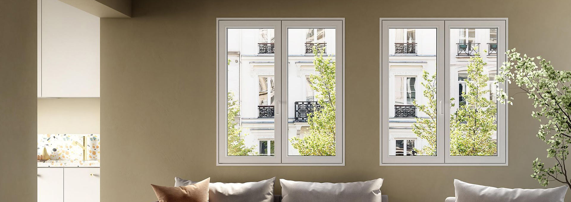 Infissi Schüco Alluminio a Roma: eleganza e isolamento Coppia di finestre Schüco in alluminio bianco a doppio battente, installate in un ambiente moderno con vista su palazzi storici.