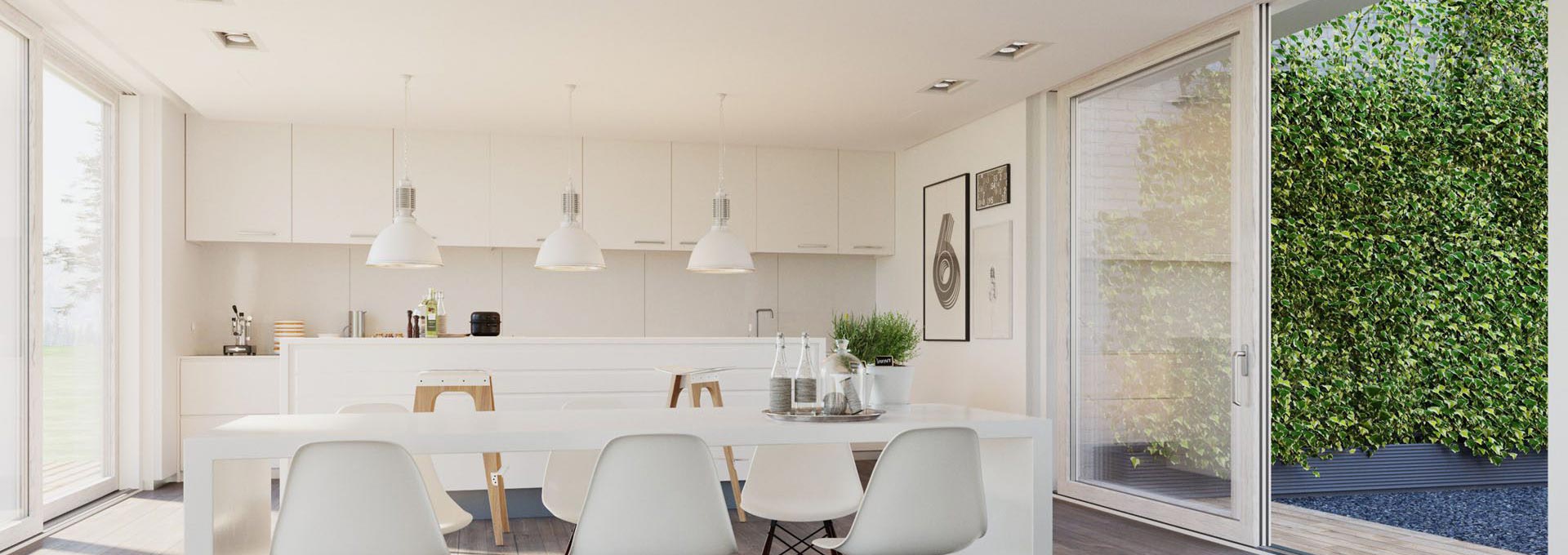Luminosità e isolamento: scorrevoli Schüco in PVC per la tua cucina Porta-finestra scorrevole Schüco in PVC bianco effetto legno chiaro in una cucina moderna minimalista.