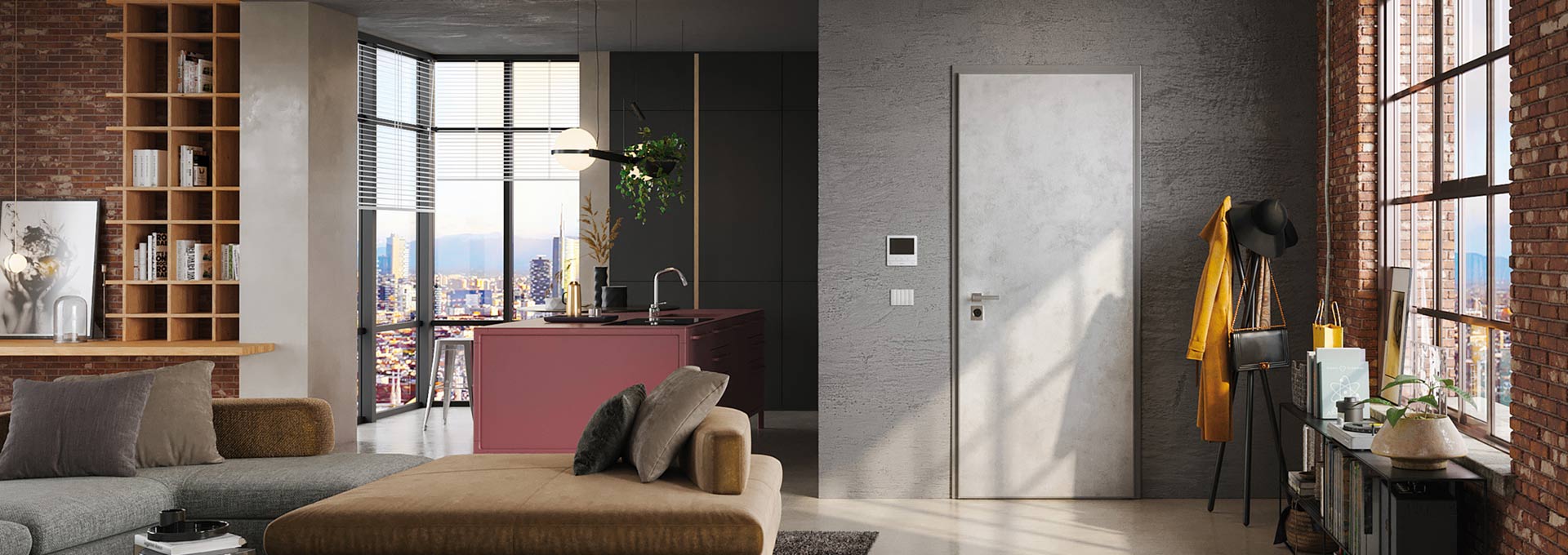Okey Porte Blindate: finiture materiche per interni di design Porta blindata Okey da interno con pannello effetto cemento materico, integrata in un loft moderno con pareti in mattoni e cucina a isola.
